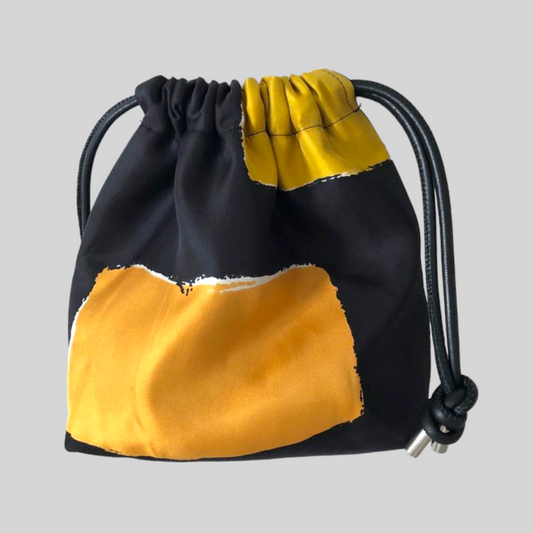 Abstract Orange and Black Bag