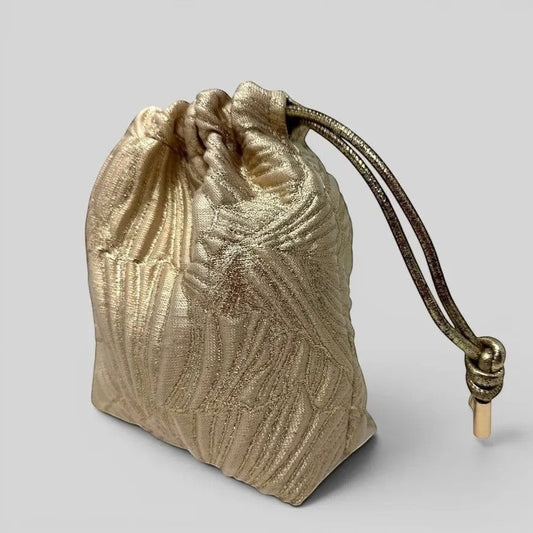 Prettysac luxurious gold drawstring pouch with embossed pattern and secure closure, perfect for jewelry or keepsakes.