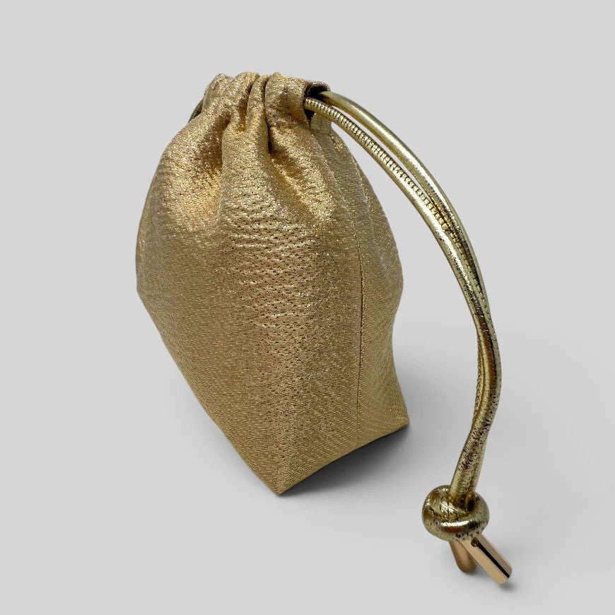 Prettysac gold textured fabric drawstring pouch with metallic gold cord and closure. Ideal for jewelry, makeup, or travel.
